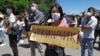 Участница митинга #RЕакция в Бишкеке в 2020 году. 