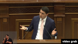 Head of the Investigative Committee Argishti Kyaramian speaks in parliament, October 15, 2024